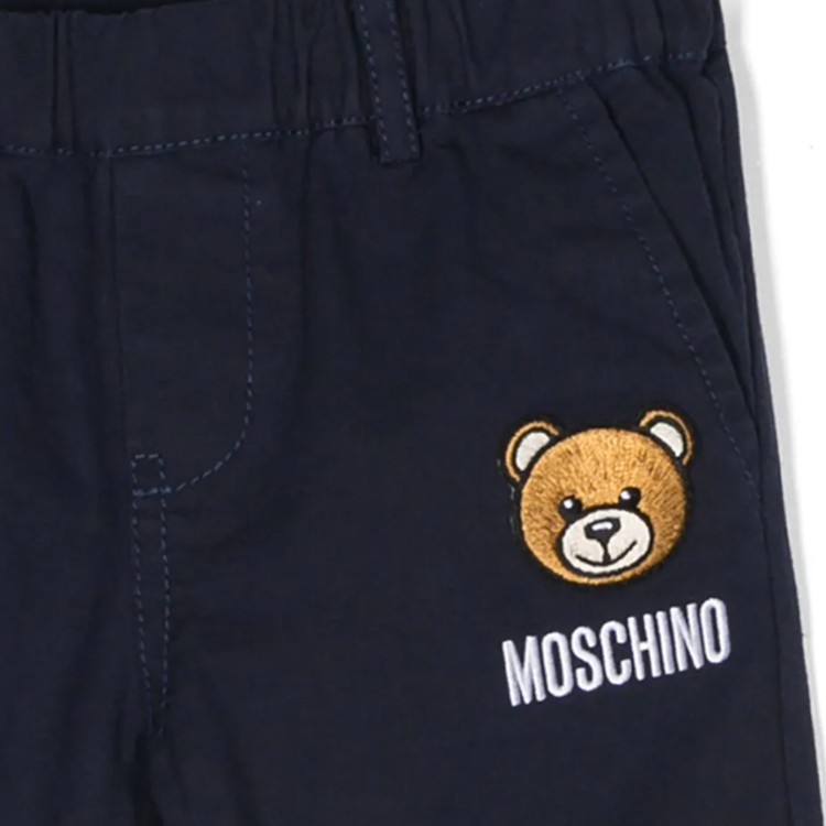 MOSCHINO Pantaloni affusolati  blu applicazione Teddy neonato