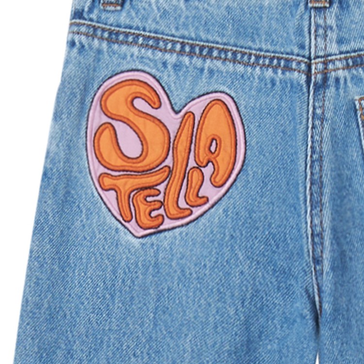 STELLA McCARTNEY Jeans chiari con applicazione bambina