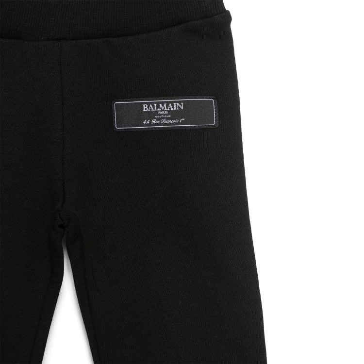 BALMAIN Pantaloni neri sportivi con applicazione neonati