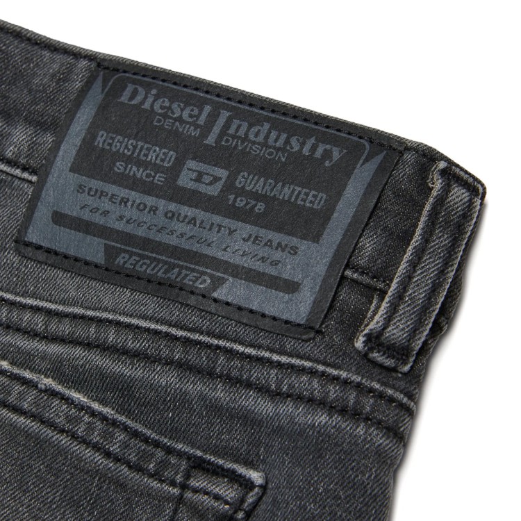 DIESEL Jeans neri 1978-J a zampa bambina