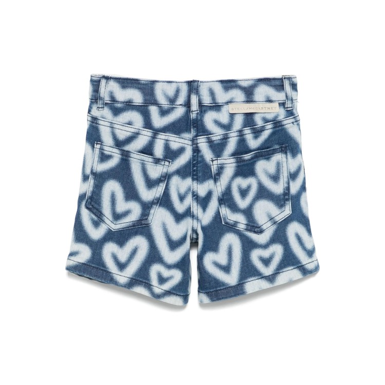 STELLA McCARTNEY Shorts in denim bicolore con motivo a cuori bambina