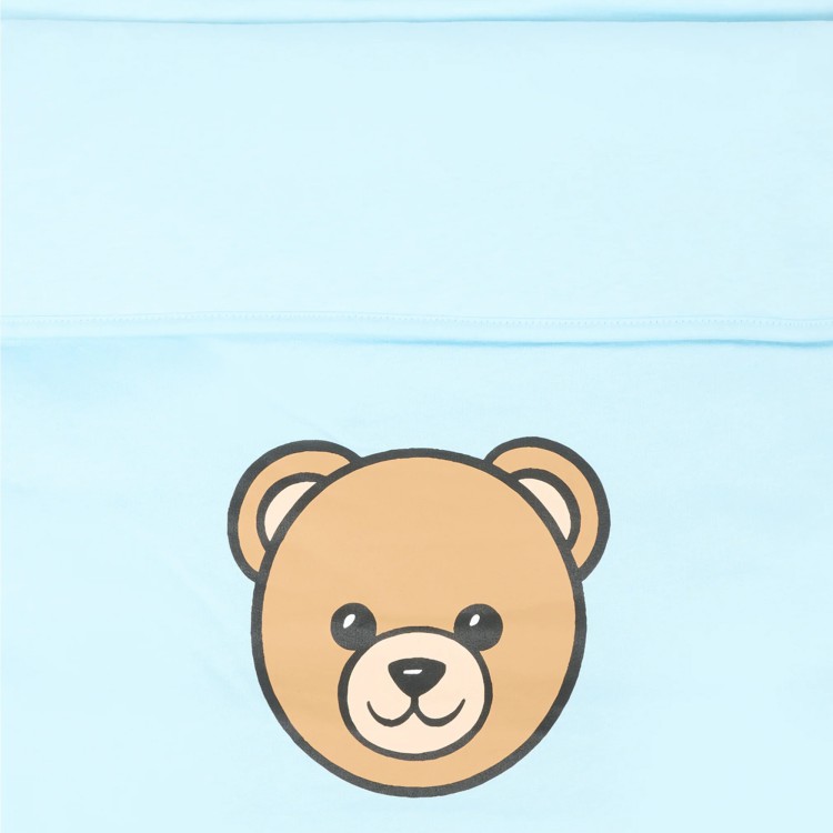 MOSCHINO Sacco nanna celeste con logo Bear neonato